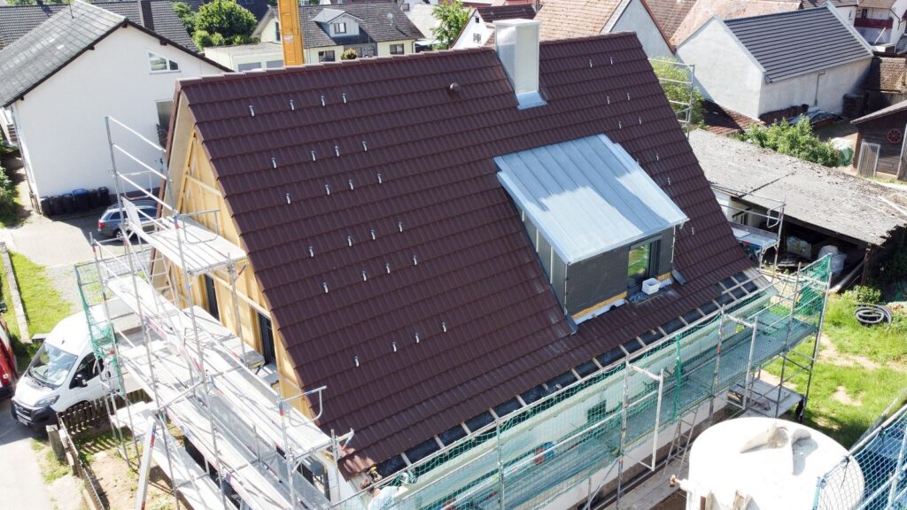 Energetische Dachsanierung mit Holzfassade – Zimmerei & Holzbau Seitz im Spessart